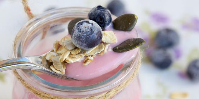probiotic yogurt in a jar with antioxidant blueberries